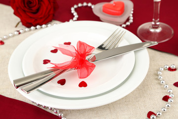 Table setting in honor of Valentine's Day close-up