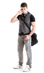 Fototapeta premium Full length portrait school boy talking phone