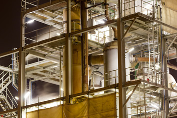 Close-up of industrial pipelines of an oil-refinery plant