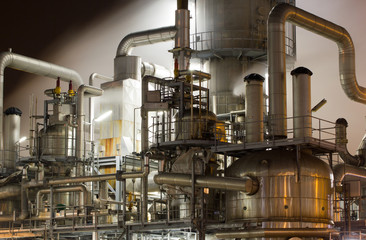 Close-up of industrial pipelines of an oil-refinery plant