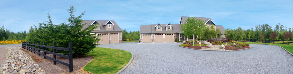 Large farm country house with gravel driveway