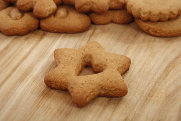 Baked cookie biscuit shaped as heart in star