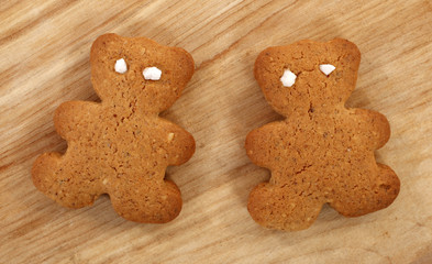 Two baked cookies shaped as teddy bears