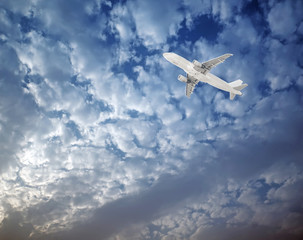 Naklejka na ściany i meble Airplane in the sky