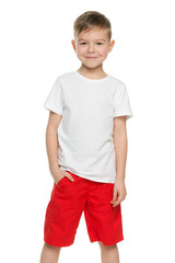 Smiling little boy in white shirt