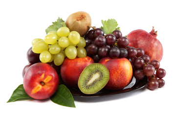 Fruits nectarine and a bunch of grapes isolated against white ba