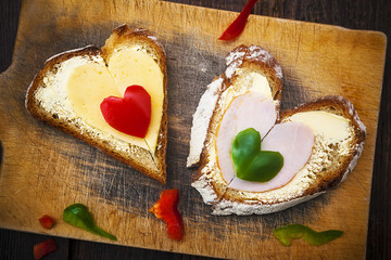 heart sandwich shape wood board peppers food