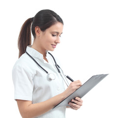 Beautiful nurse smiling and taking notes