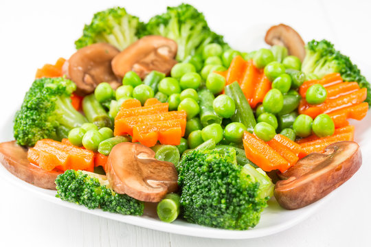 Mixed vegetables on a white plate