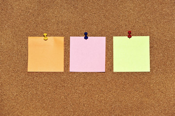 Post it notes on wooden background