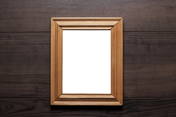 empty frame with copy space on wooden wall