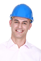 Smiling man wearing a hardhat
