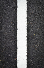 Fototapeta premium new white line on the road texture