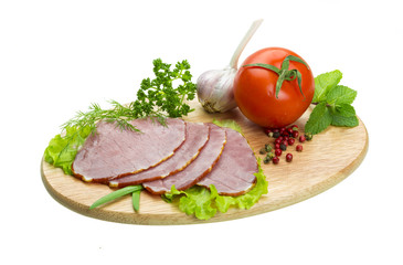 Ripe fresh ham with vegetables