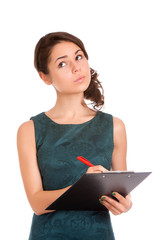 Young woman holding clipboard and thinking