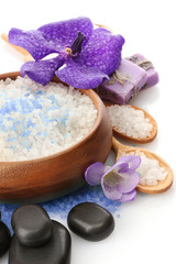 Beautiful spa setting with flower, isolated on white