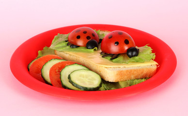 Fun food for kids on pink background