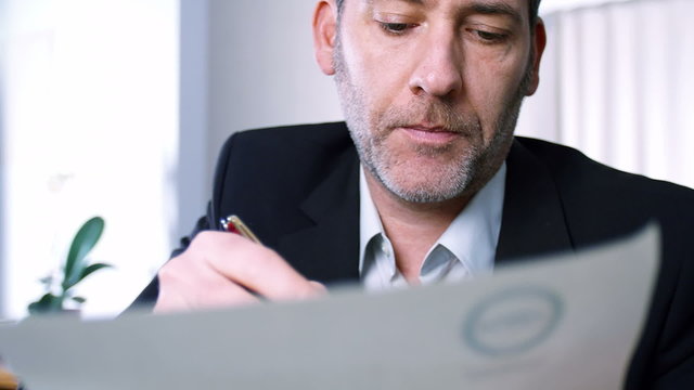 Businessman signs a contract