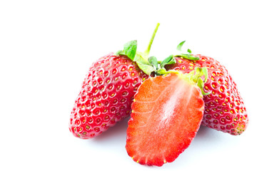 strawberries placed on a white background