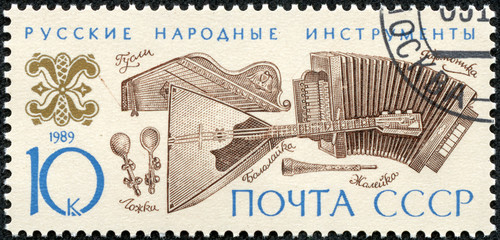 stamp printed in the USSR shows Russian folk music instruments