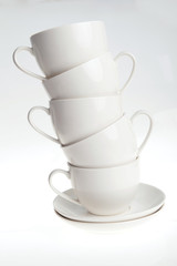 coffee cups with saucers