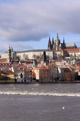 View on the winter Prague gothic Castle above River Vltava