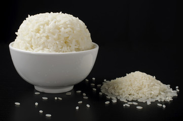 White steamed rice in ceramic bowl and polished rice