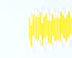 Cotton swabs over a white background
