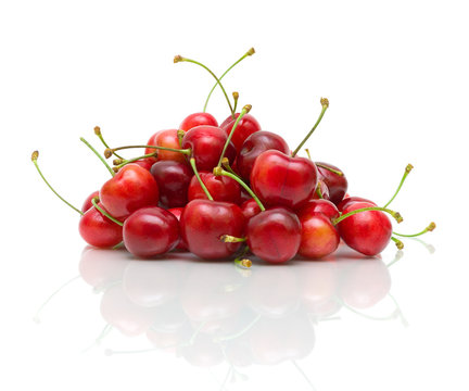 ripe cherry on a white background with reflection