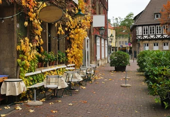 Foto op Canvas Street cafe in the autumn in a European city © allegro60