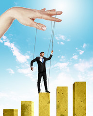 Business man marionette