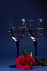 Two glasses with vine and  roses