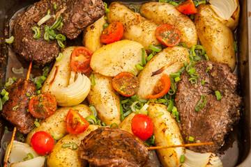 juicy steak beef meat with tomato and french potatoes 