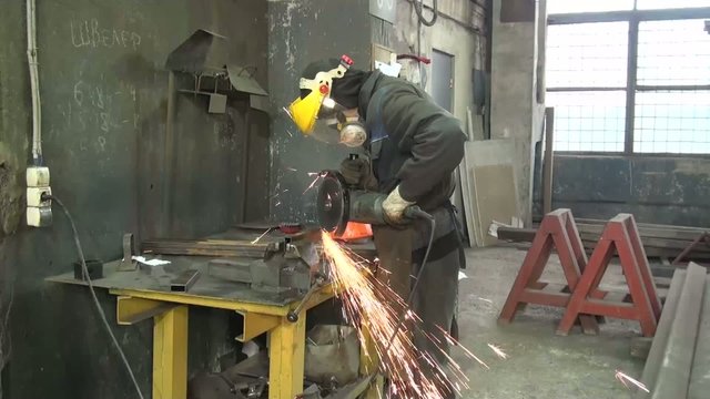 Manual worker in steel factory