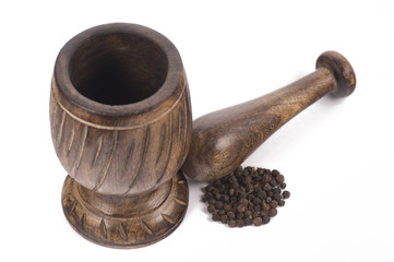 mortar and pestle with pepper - isolated