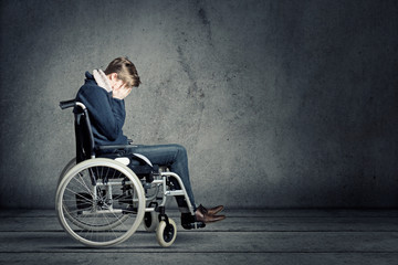 Young Man in Wheel Chair - obrazy, fototapety, plakaty