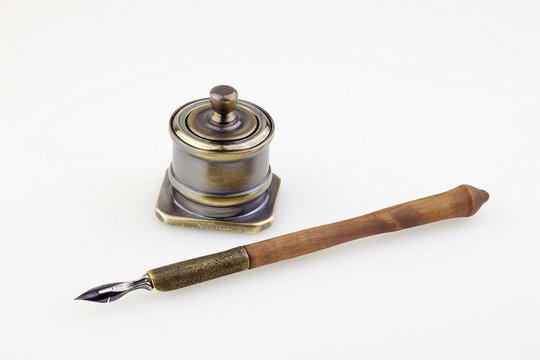 Antique  Ink Pen  And Inkwell Isolated