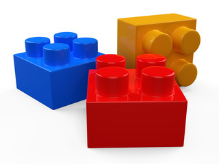 3D colorful plastic toy blocks. Isolated white background.