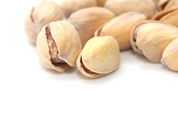 pistachios on a white background. macro