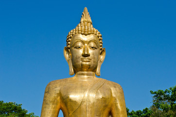 Golden Buddha statue at temple of Thailand