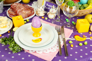 Serving Easter table with tasty dishes close-up