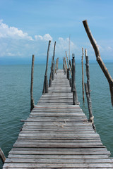 Fototapeta premium Wooden Bridge In The Sea