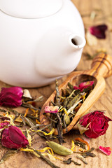 Green tea with fruits, spices, rose petals in a scoop