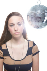 Naklejka premium Serious Woman In Front Of Disco Ball
