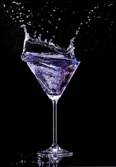 Martini drink isolated on black background