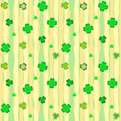 Seamless background with leaves of shamrock