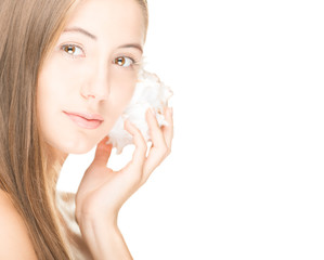Pretty woman with seashell isolated on white.