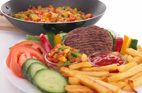 beefsteak with vegetables and fries