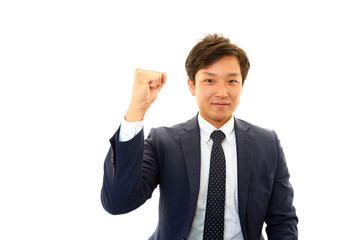 ガッツポーズのビジネスマン