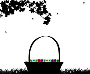 Easter basket with Easter eggs under the tree silhouette